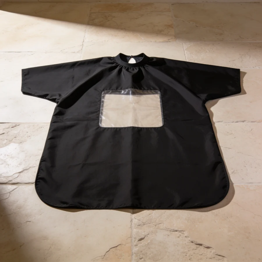 Viewing-Window Cutting Cape — Black / clear